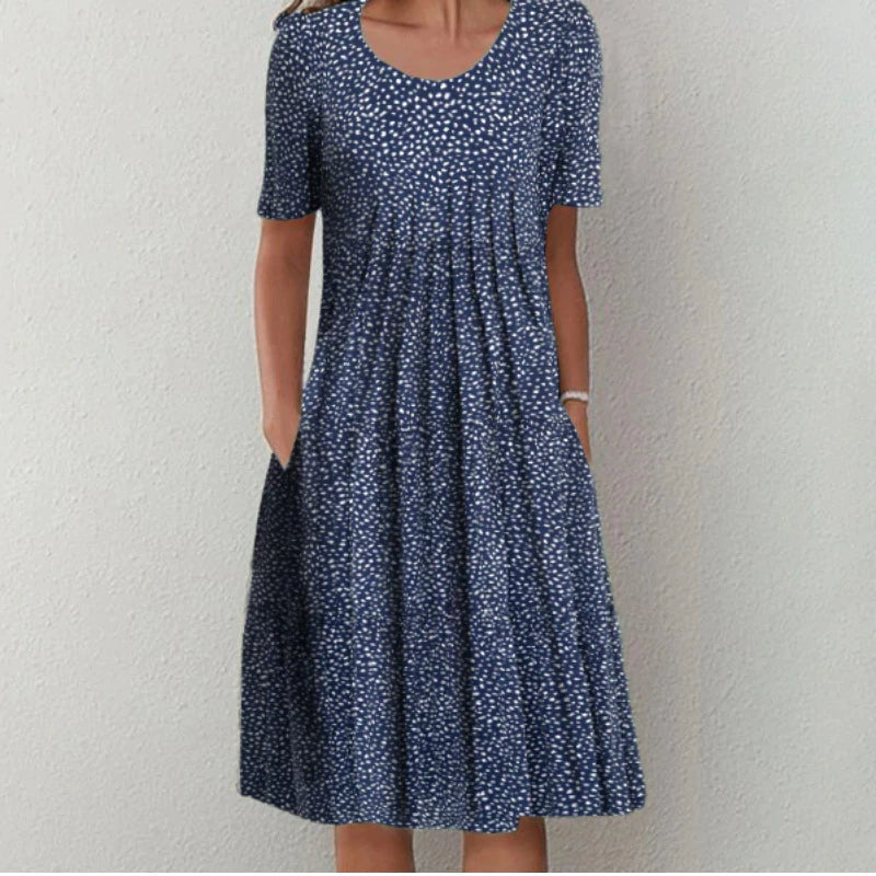 Yrsa | Stilfull og Casual Blomstret Kjole med Lommer